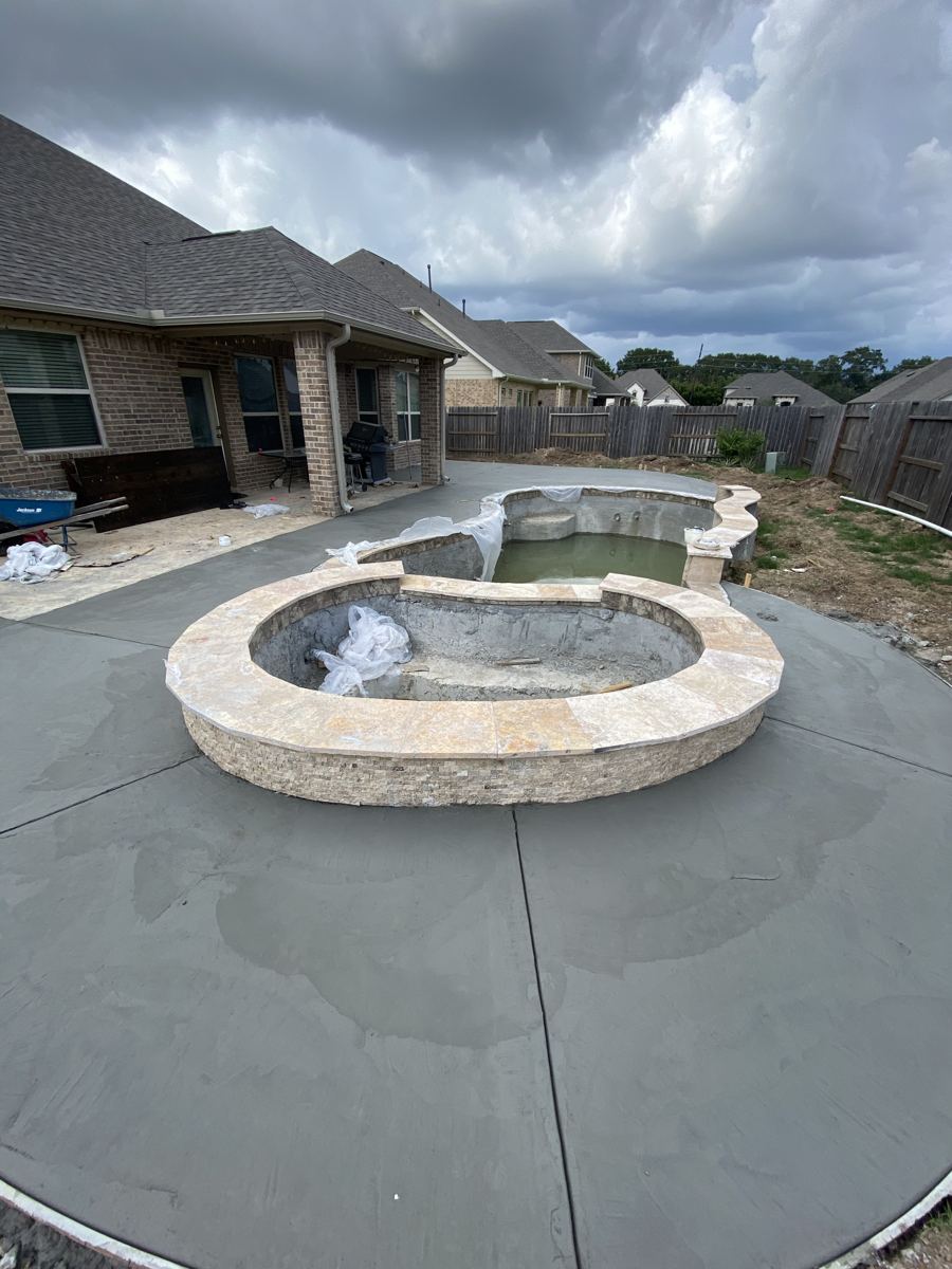 Pool and spa with new concrete deck